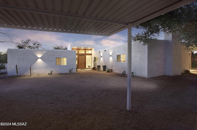 exterior space featuring stucco siding