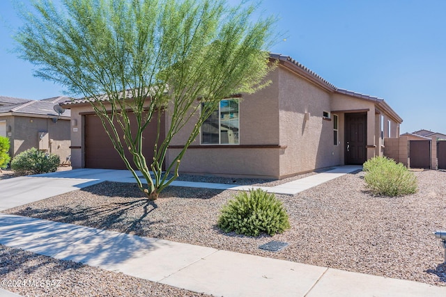 view of front of home with a garage