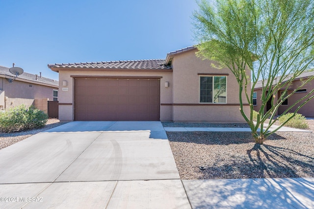 view of front of property with a garage