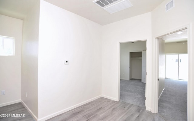 spare room with light wood-type flooring