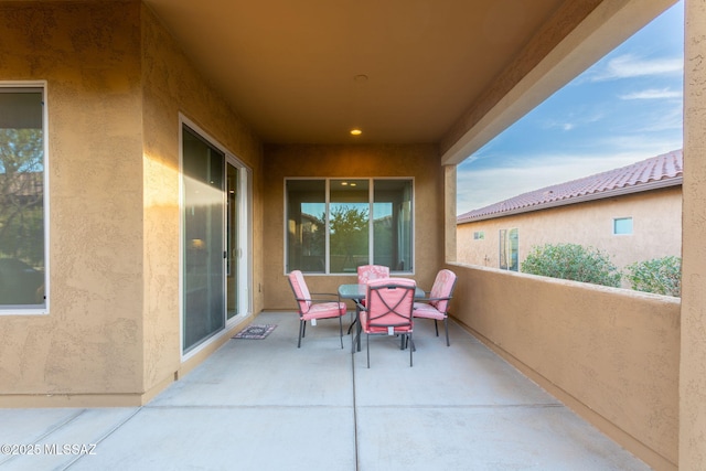 view of patio / terrace featuring a balcony