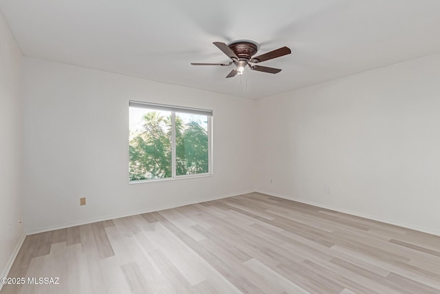 unfurnished room featuring ceiling fan and light hardwood / wood-style floors