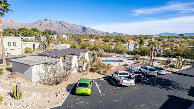 birds eye view of property featuring a mountain view