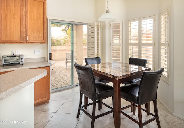 view of tiled dining space