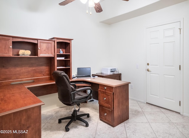 tiled office space featuring ceiling fan