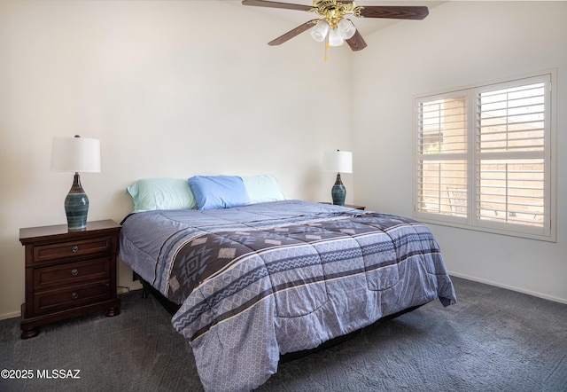 bedroom featuring multiple windows, ceiling fan, and carpet floors