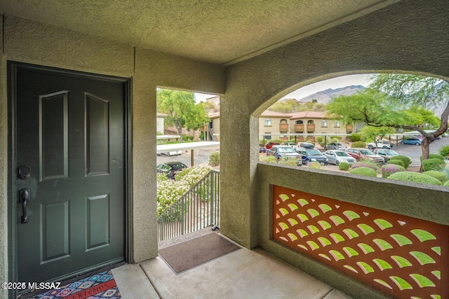 entrance to property with a mountain view