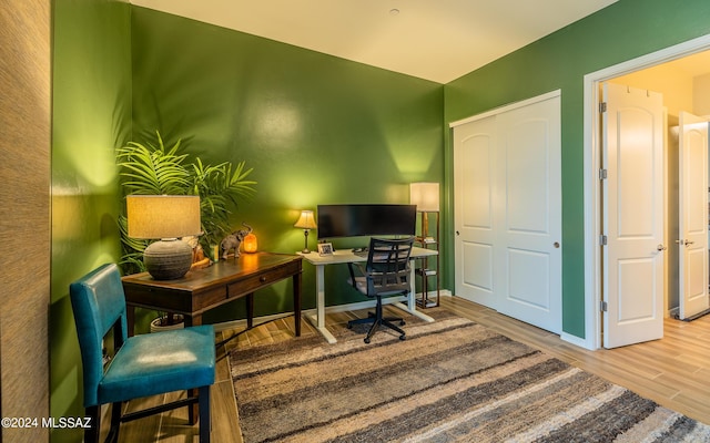 office area with hardwood / wood-style flooring