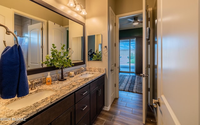 bathroom featuring vanity and ceiling fan