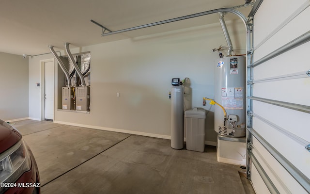 garage with heating unit and water heater