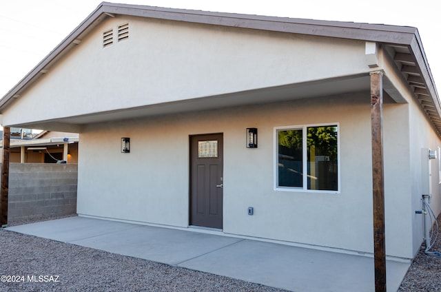 view of front of house with a patio area