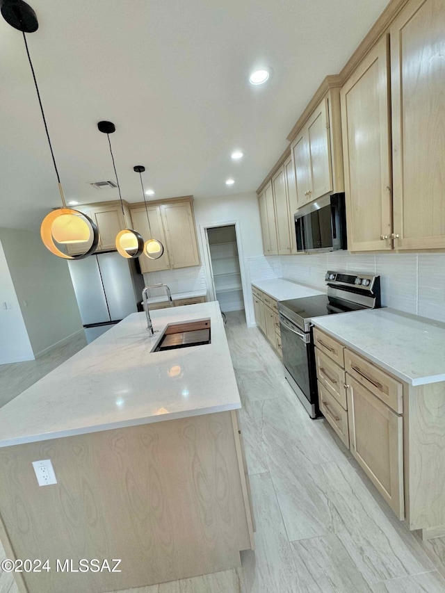 kitchen featuring light brown cabinets, backsplash, sink, stainless steel electric range oven, and decorative light fixtures