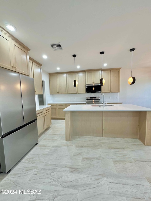 kitchen featuring appliances with stainless steel finishes, backsplash, sink, light brown cabinets, and decorative light fixtures