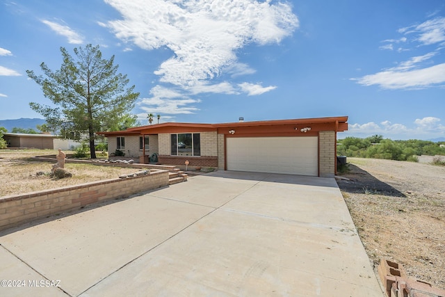 ranch-style home with a garage