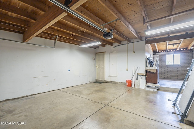 garage featuring a garage door opener