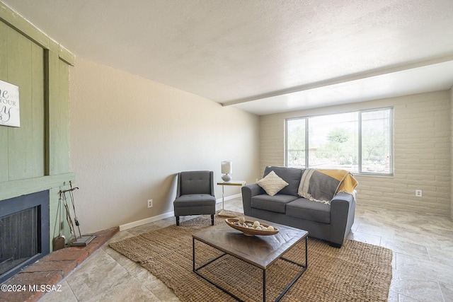 living room featuring a textured ceiling