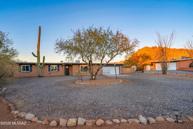 single story home with a garage