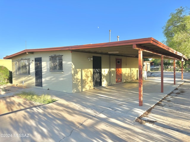 view of front of house with a carport