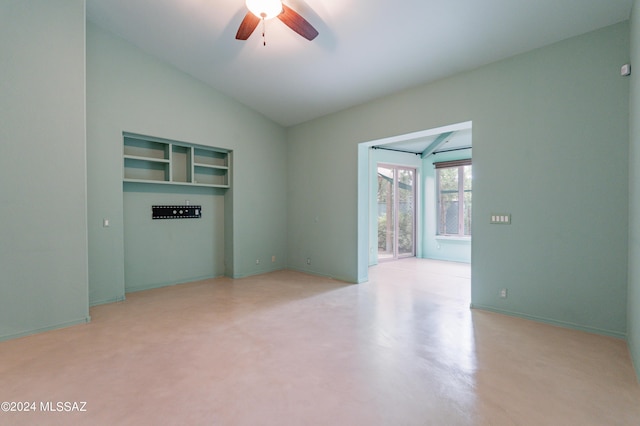 unfurnished room featuring vaulted ceiling and ceiling fan