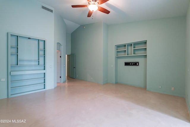 interior space with ceiling fan, built in features, and lofted ceiling