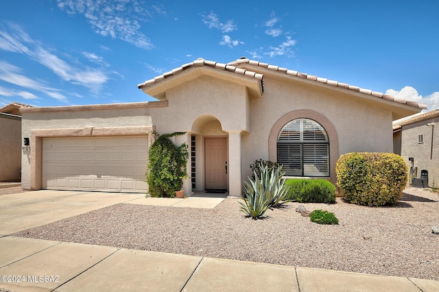 view of front of house with a garage