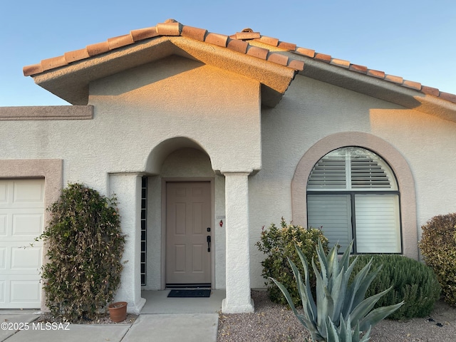 entrance to property with a garage