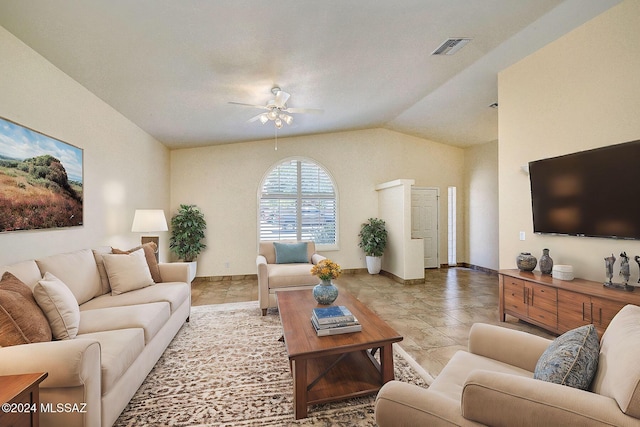 living room with tile patterned flooring, ceiling fan, and vaulted ceiling