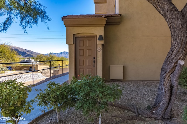 doorway to property featuring a mountain view