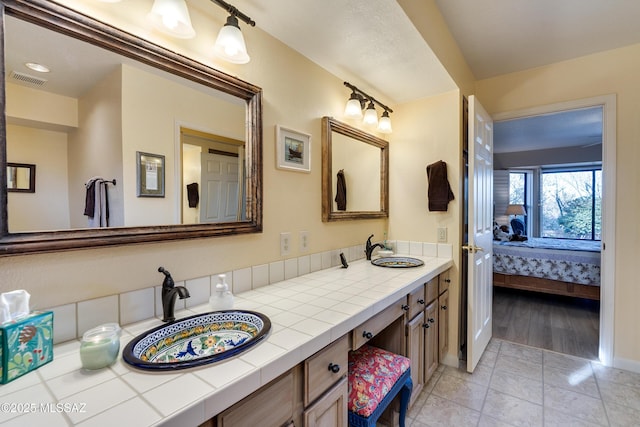 bathroom featuring vanity and tile patterned floors