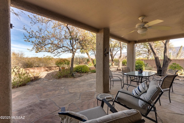 view of patio with ceiling fan