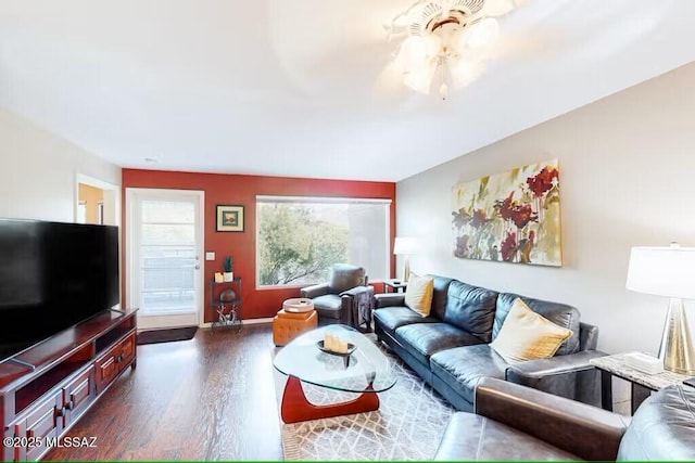 living room with dark hardwood / wood-style floors