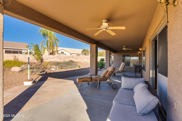 view of patio / terrace featuring ceiling fan