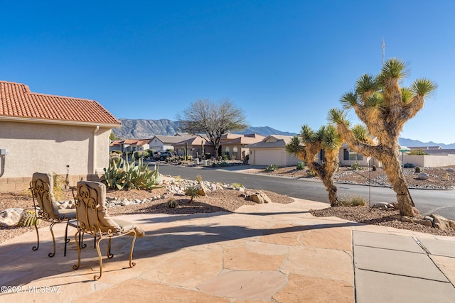 exterior space featuring a mountain view