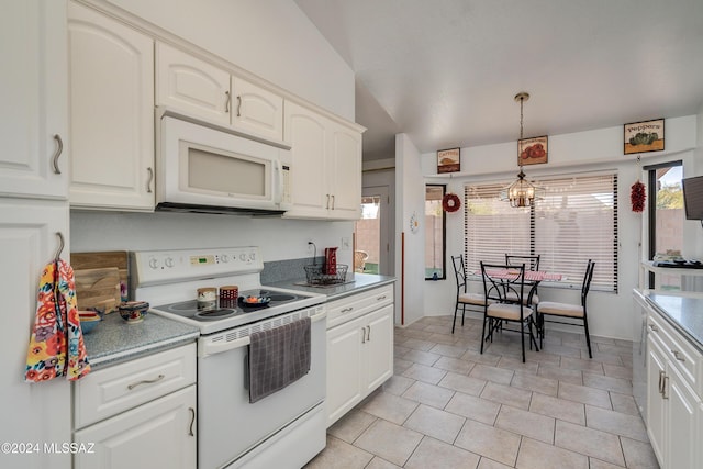 kitchen featuring pendant lighting, white cabinets, and white appliances