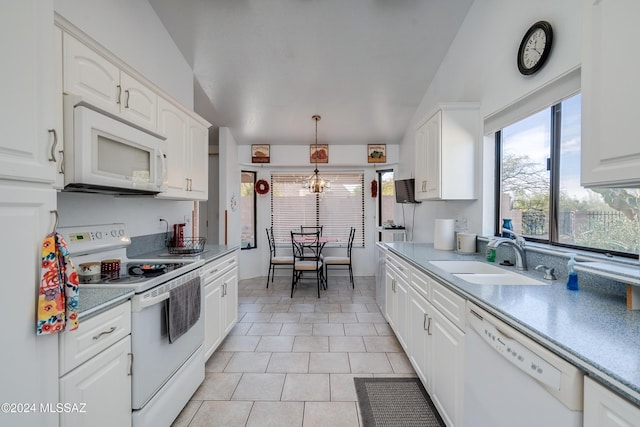 kitchen featuring white cabinets, white appliances, and sink