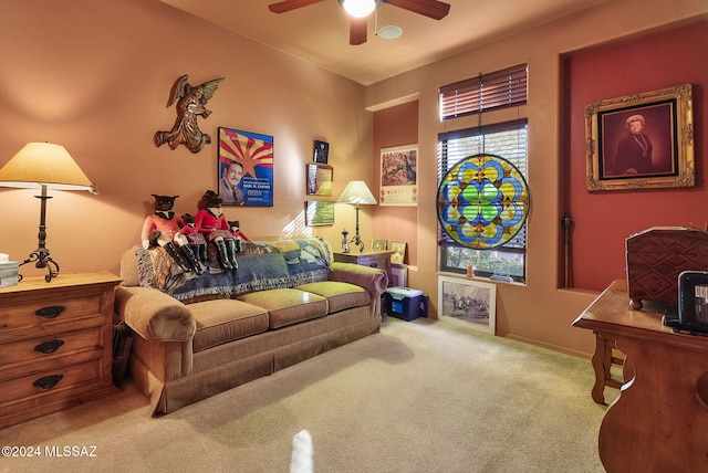 living room featuring ceiling fan and light carpet