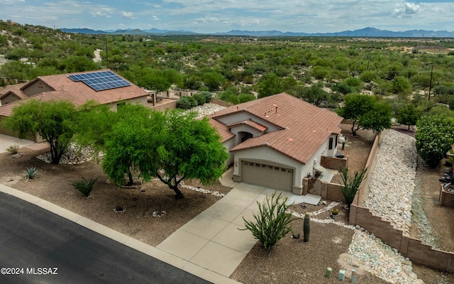 bird's eye view with a mountain view