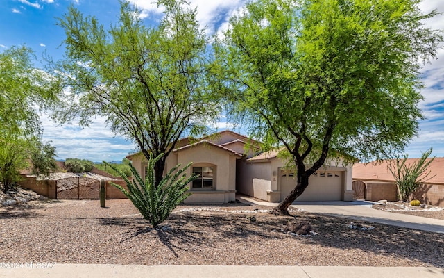 view of front of property featuring a garage