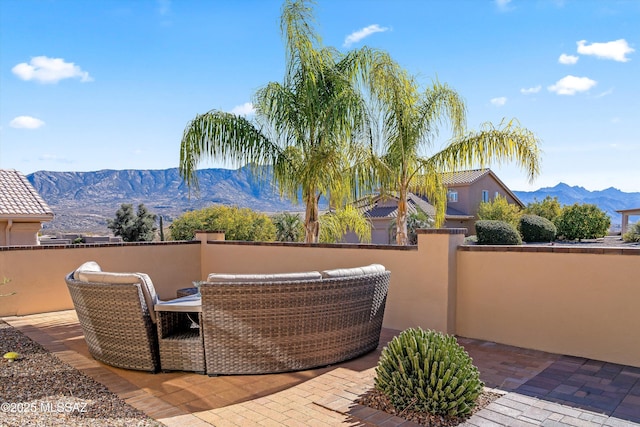 view of patio with a mountain view