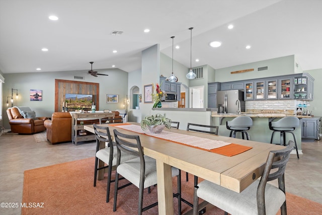 dining room featuring recessed lighting, visible vents, ceiling fan, and lofted ceiling