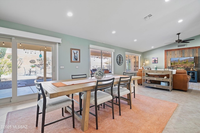 dining space with light tile patterned floors, lofted ceiling, visible vents, and recessed lighting