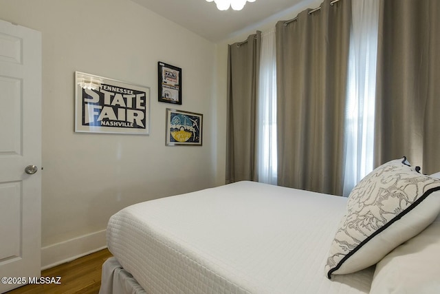 bedroom featuring dark hardwood / wood-style floors