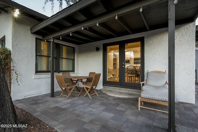 view of patio featuring french doors