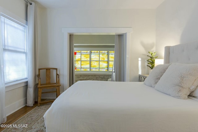 bedroom featuring hardwood / wood-style flooring