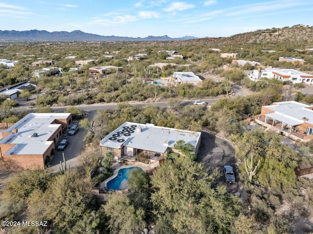birds eye view of property featuring a mountain view