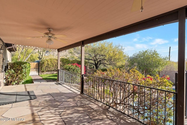 view of patio featuring ceiling fan