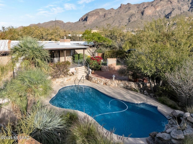 view of pool with a mountain view