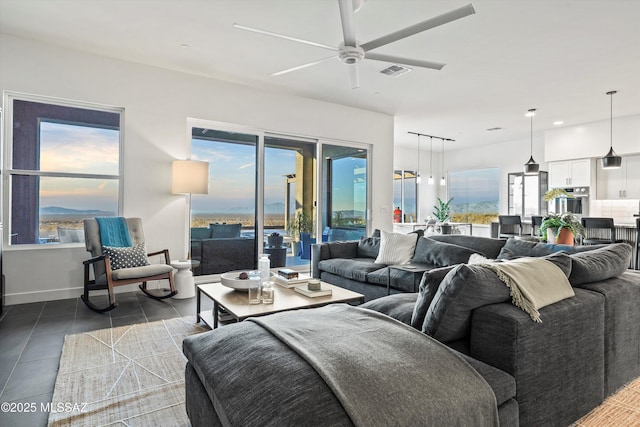 living room with ceiling fan