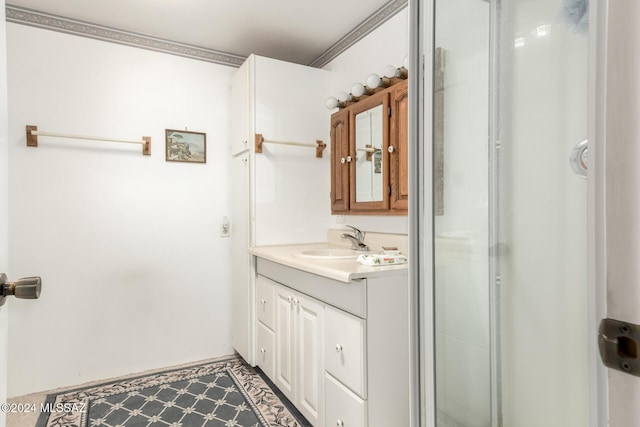 bathroom with vanity and an enclosed shower