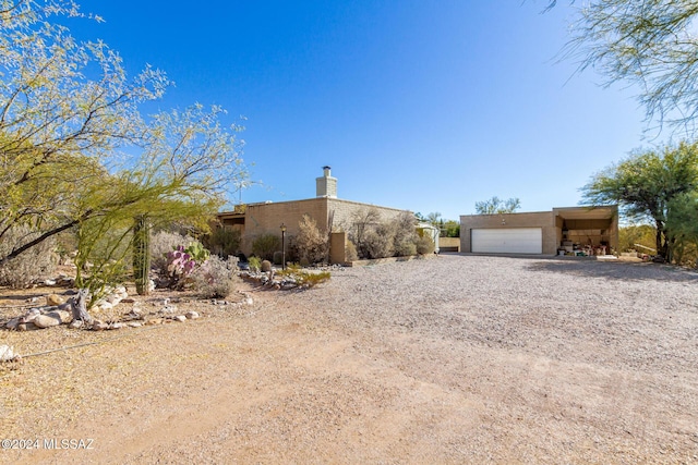 exterior space with a garage